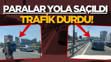 Paralar yola saçıldı, trafik durdu!