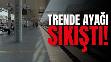 Trende ayağı sıkıştı! 